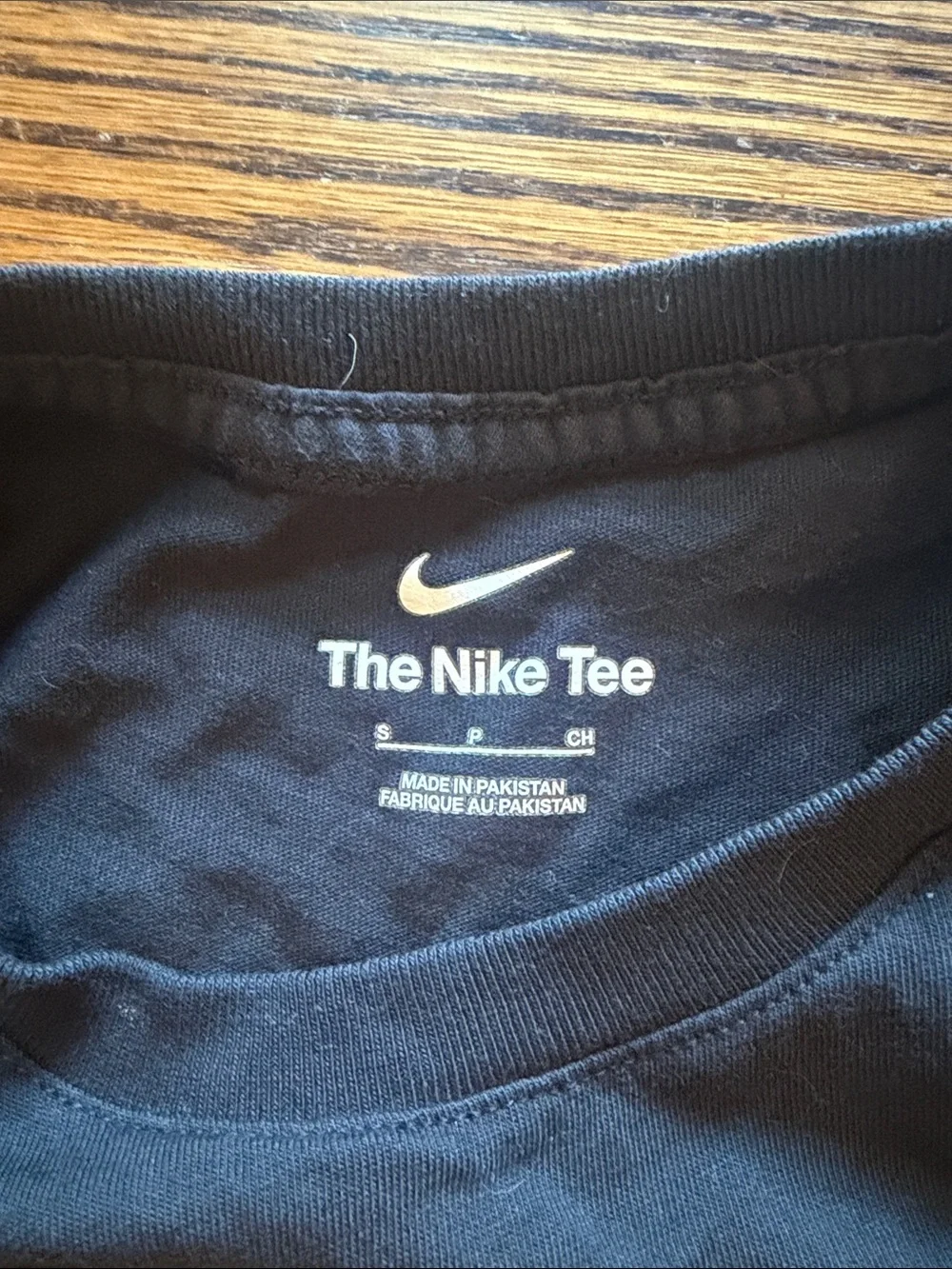 Nike Men’s Black T-Shirt with Orange Chest Graphic
